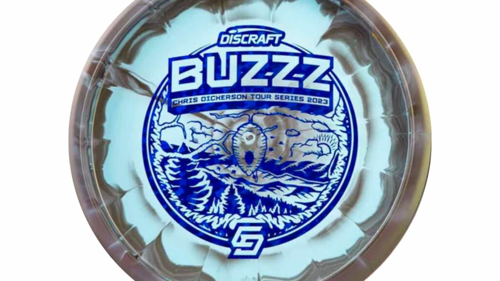 A Discraft Buzz Chris Dickerson Tour Series 2023 with grey and light blue marbled dye color and blue stamp 