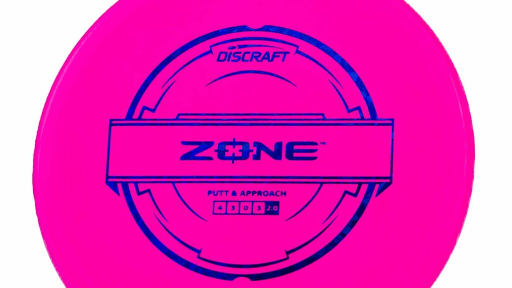 A Hot pink Discraft Putter Line Zone Disc with blue stamp