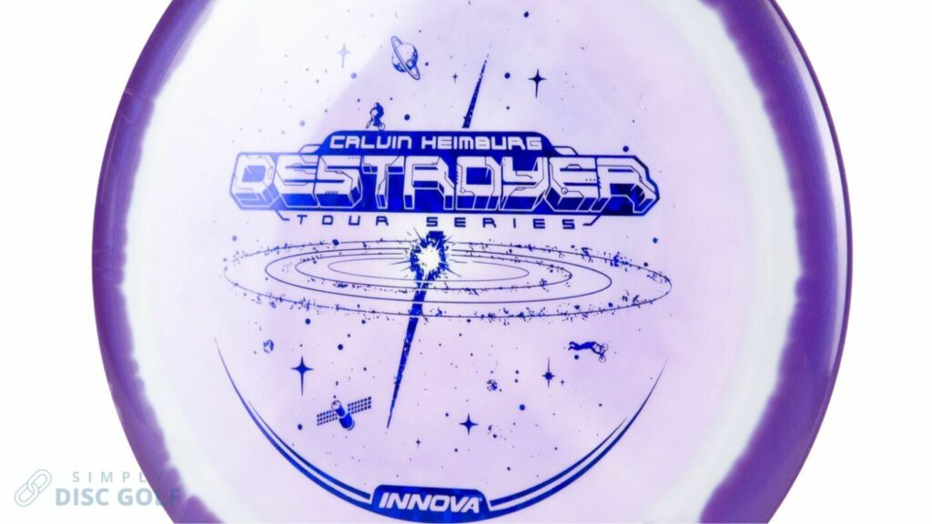 A purple/white Innova Destroyer with Blue Stamp